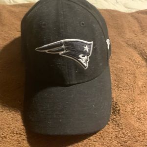 Black and white, New England Patriots hat.